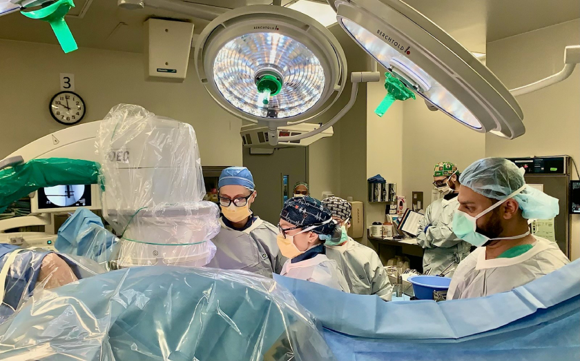 University of Florida orthopaedic surgery resident assists neurosurgeons performing spinal surgery at UF Health Jacksonville